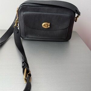 Coach Black and Gold Crossbody Bag with Timeless Elegance